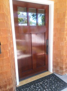 The "after" picture of a customer's front door finished by Palisades Painting Company.